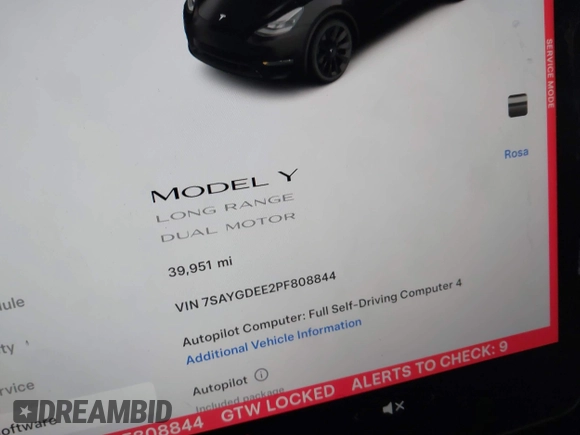 2023 Tesla Model Y Long Range with VIN 7SAYGDEE2PF808844, listed as a IAAI auction lot 41941905 with 39,951 mi miles and . Bid and sale history available at carsss.com. Image 16.