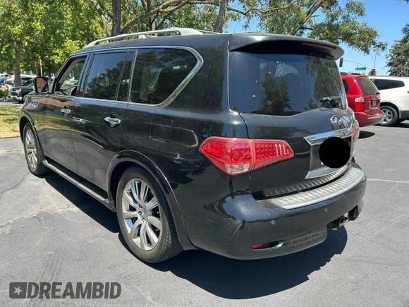 2014 Infiniti QX80 z VIN JN8AZ2NE6E9062908, wystawiony jako Copart lot #61263115 z przebiegiem 155 836 mil mil oraz Czysty tytuł • Clean title. Historia ofert i sprzedaży dostępna na DreamBid. Obrazek 3.
