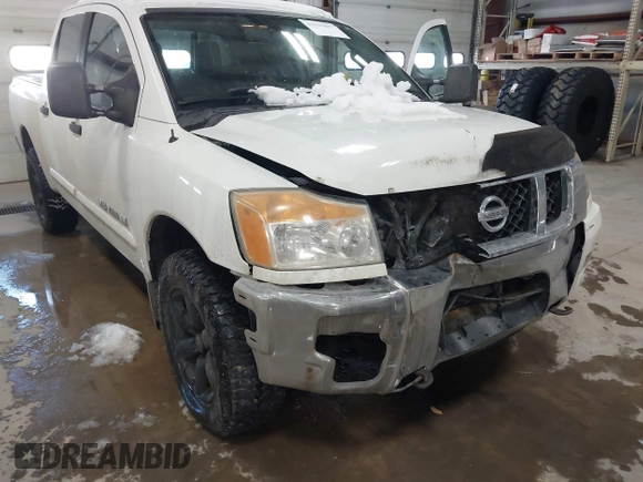 2014 Nissan Titan S with VIN 1N6AA0EC2EN512337, listed as a IAAI auction lot 41337837 with 187,540 mi miles and . Bid and sale history available at DreamBid. Image 6.