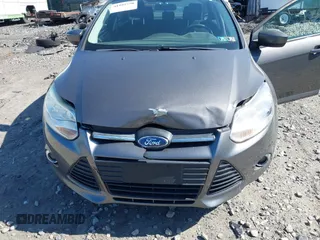 2012 Ford Focus SE with VIN 1FAHP3F27CL276208, listed as a IAAI auction lot 41995770 with 98,004 mi miles. Bid and sale history available at carsss.com. Image 6.