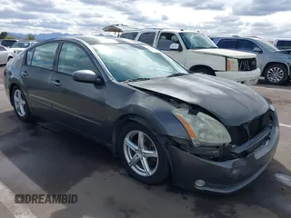 2005 Nissan Maxima SE z VIN 1N4BA41E25C877348, wystawiony jako IAAI lot #41809216 z przebiegiem 145 714 mil mil oraz . Historia ofert i sprzedaży dostępna na DreamBid. Obrazek 1.