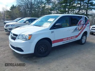 2017 Dodge Grand Caravan SE with VIN 2C7WDGBG3HR828825, listed as a IAAI auction lot 42048885 with 231,690 mi miles and . Bid and sale history available at DreamBid. Image 2.