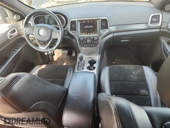 2018 Jeep Grand Cherokee Laredo E z VIN 1C4RJFAGXJC287415, wystawiony jako Copart lot #64182975 z przebiegiem 103 817 mil mil oraz Szkoda całkowita • Salvage title. Historia ofert i sprzedaży dostępna na DreamBid. Obrazek 8.