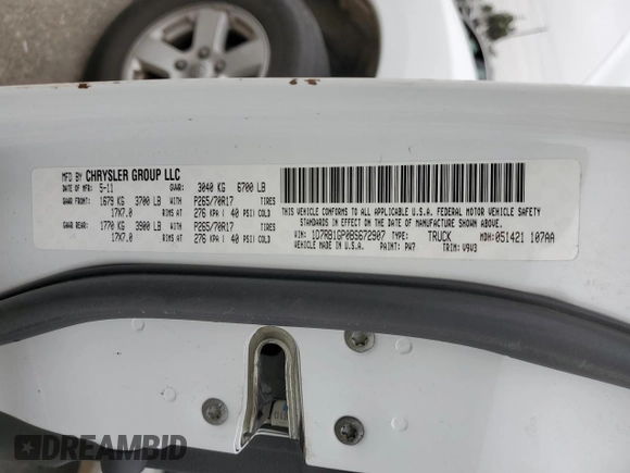 2011 Ram 1500 SLT with VIN 1D7RB1GP0BS672907, listed as a Copart auction lot 61641725 with 130,826 mi miles and Salvage title. Bid and sale history available at DreamBid. Image 12.