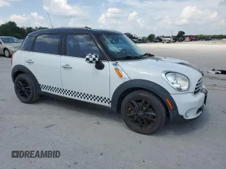 2012 MINI Countryman with VIN WMWZB3C56CWM04896, listed as a Copart auction lot 63803045 with 96,443 mi miles and Clean title. Bid and sale history available at DreamBid. Image 4.