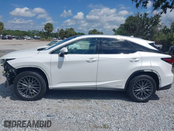 2021 Lexus RX with VIN 2T2JGMDA9MC058061, listed as a IAAI auction lot 42031419 with 40,698 mi miles. Bid and sale history available at carsss.com. Image 15.