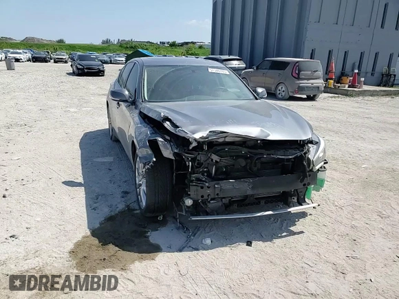 2020 Infiniti Q50 Luxe z VIN JN1EV7AP2LM203614, wystawiony jako Copart lot #57346785 z przebiegiem 62 659 mil mil oraz Nie do naprawy • Non repairable. Historia ofert i sprzedaży dostępna na DreamBid. Obrazek 14.