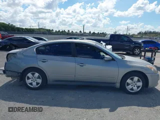 2007 Nissan Altima 2.5 S with VIN 1N4AL21E27C174572, listed as a IAAI auction lot 41561396 with 148,497 mi miles. Bid and sale history available at carsss.com. Image 14.