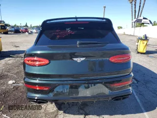 2022 Bentley Bentayga V8 z VIN SJAAM2ZV6NC016276, wystawiony jako Copart lot #39583644 z przebiegiem 5412 mil mil oraz . Historia ofert i sprzedaży dostępna na DreamBid. Obrazek 6.