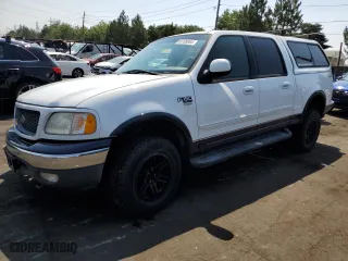 2001 Ford F-150 SuperCrew XLT with VIN 1FTRW08L31KF24186, listed as a Copart auction lot 65188904 with 0 mi miles and Salvage Title. Bid and sale history available at carsss.com. Image 1.