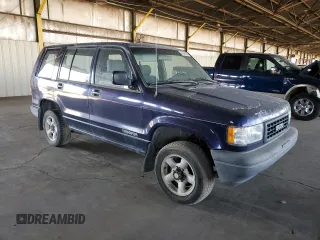 1995 Isuzu Trooper z VIN JACDJ58V8S7908300, wystawiony jako Copart lot #46450195 z przebiegiem 256 256 mil mil oraz Czysty tytuł • Clean title. Historia ofert i sprzedaży dostępna na DreamBid. Obrazek 4.