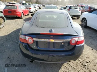 2009 Jaguar XK with VIN SAJWA43B995B30780, listed as a Copart auction lot 79119264 with 0 mi miles and Salvage Title. Bid and sale history available at carsss.com. Image 6.