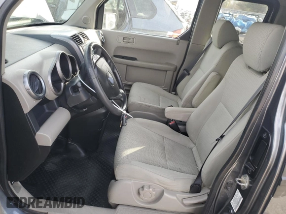 2010 Honda Element EX with VIN 5J6YH1H75AL006079, listed as a Copart auction lot 87446514 with 146,422 mi miles and Salvage Title. Bid and sale history available at DreamBid. Image 7.