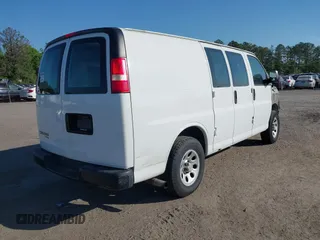 2014 Chevrolet Express Cargo Van with VIN 1GCSGAFX2E1151373, listed as a IAAI auction lot 42045528 with 123,718 mi miles. Bid and sale history available at carsss.com. Image 4.