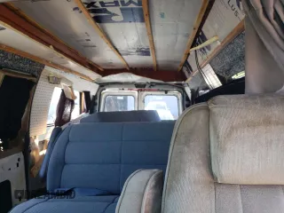 1997 Ford Econoline Commercial with VIN 1FDEE1463VHB51558, listed as a Copart auction lot 48181825 with 127,125 mi miles and Salvage Title. Bid and sale history available at carsss.com. Image 10.