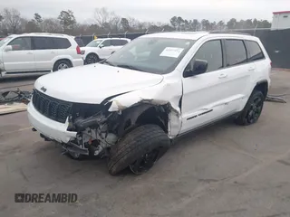 2018 Jeep Grand Cherokee Laredo E with VIN 1C4RJFAG2JC503130, listed as a IAAI auction lot 41527333 with 95,669 mi miles. Bid and sale history available at carsss.com. Image 2.