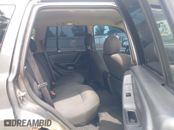 2004 Jeep Grand Cherokee Laredo with VIN 1J4GW48S44C352538, listed as a IAAI auction lot 42765905 with 249,220 mi miles and . Bid and sale history available at DreamBid. Image 8.