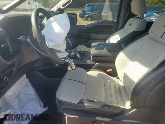 2022 Ford F-150 Lightning Pro z VIN 1FT6W1EV7NWG10601, wystawiony jako Copart lot #55057445 z przebiegiem Nie podano mil oraz Szkoda całkowita • Salvage title. Historia ofert i sprzedaży dostępna na DreamBid. Obrazek 7.