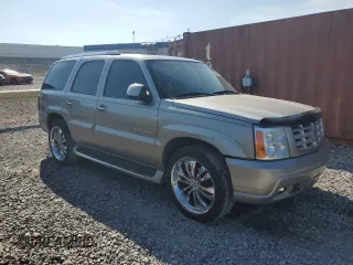 2003 Cadillac Escalade z VIN 1GYEC63T83R157632, wystawiony jako Copart lot #54950564 z przebiegiem 88 527 mil mil oraz Szkoda całkowita • Salvage title. Historia ofert i sprzedaży dostępna na DreamBid. Obrazek 4.