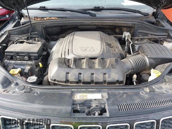 2015 Jeep Grand Cherokee Overland with VIN 1C4RJFCT4FC138404, listed as a IAAI auction lot 41188085 with 152,486 mi miles. Bid and sale history available at carsss.com. Image 10.