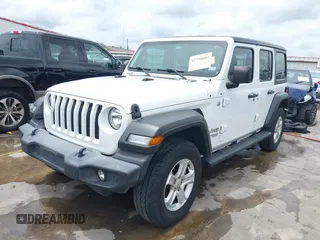 2019 Jeep Wrangler Unlimited Sport S with VIN 1C4HJXDN3KW689739, listed as a IAAI auction lot 42358604 with 73,271 mi miles and . Bid and sale history available at DreamBid. Image 2.