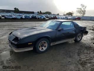 1984 Chevrolet Camaro Z28 Sport with VIN 1G1AP87G7EL175104, listed as a Copart auction lot 86895534 with 27,874 mi miles and Salvage Title. Bid and sale history available at carsss.com. Image 1.