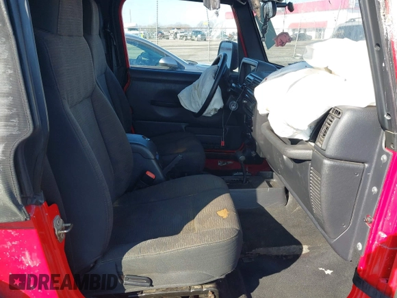 2005 Jeep Wrangler X with VIN 1J4FA39S95P385581, listed as a IAAI auction lot 41333338 with 150,010 mi miles and . Bid and sale history available at DreamBid. Image 5.