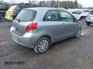 2009 Toyota Yaris with VIN JTDJT903095230292, listed as a IAAI auction lot 41958247 with 330,127 mi miles and . Bid and sale history available at DreamBid. Image 4.