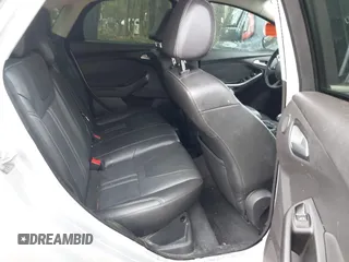 2014 Ford Focus Titanium with VIN 1FADP3J20EL148417, listed as a IAAI auction lot 41954291 with 120,098 mi miles. Bid and sale history available at carsss.com. Image 8.