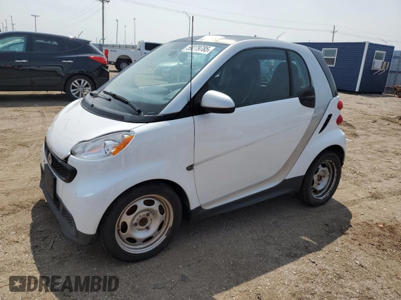 2014 Smart fortwo Pure z VIN WMEEJ3BA5EK779399, wystawiony jako Copart lot #59279785 z przebiegiem 117 204 mil mil oraz Czysty tytuł • Clean title. Historia ofert i sprzedaży dostępna na DreamBid. Obrazek 1.
