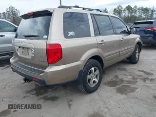 2007 Honda Pilot EX-L with VIN 5FNYF185X7B008285, listed as a IAAI auction lot 41869795 with 238,516 mi miles. Bid and sale history available at carsss.com. Image 4.