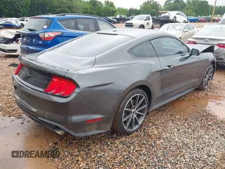 2018 Ford Mustang EcoBoost with VIN 1FA6P8TH2J5127543, listed as a IAAI auction lot 42315337 with 100,956 mi miles and . Bid and sale history available at DreamBid. Image 4.