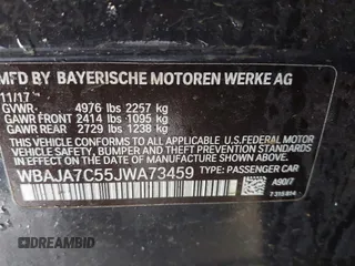2018 BMW 5 Series 530i xDrive with VIN WBAJA7C55JWA73459, listed as a IAAI auction lot 41634921 with 64,759 mi miles and . Bid and sale history available at carsss.com. Image 9.