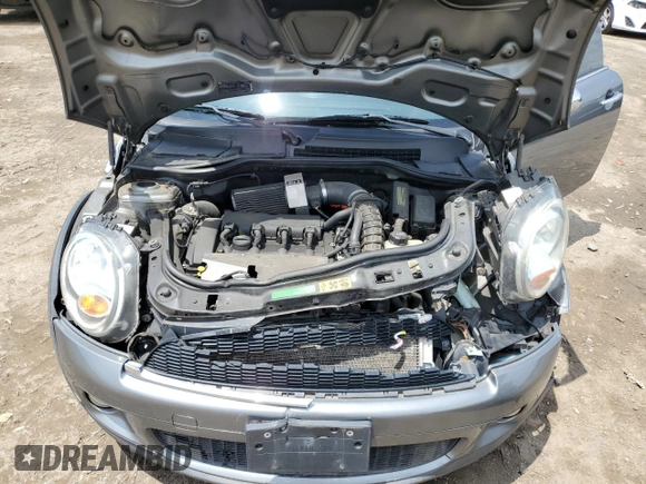 2007 MINI Hardtop S with VIN WMWMF73577TT84087, listed as a Copart auction lot 60208895 with 76,248 mi miles and Salvage title. Bid and sale history available at DreamBid. Image 11.