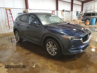 2020 Mazda CX-5 Grand Touring with VIN JM3KFBDM1L0860873, listed as a Copart auction lot 55463335 with 85,810 mi miles and Salvage Title. Bid and sale history available at DreamBid. Image 4.