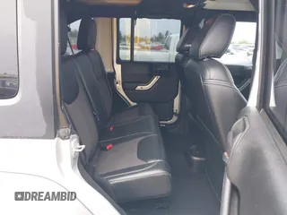 2012 Jeep Wrangler Unlimited Call of Duty MW3 with VIN 1C4BJWFG7CL281844, listed as a IAAI auction lot 42494946 with 93,669 mi miles and . Bid and sale history available at DreamBid. Image 8.