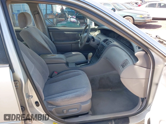 2003 Toyota Avalon XL z VIN 4T1BF28B93U274928, wystawiony jako IAAI lot #42034461 z przebiegiem 150 549 mil mil oraz . Historia ofert i sprzedaży dostępna na DreamBid. Obrazek 5.