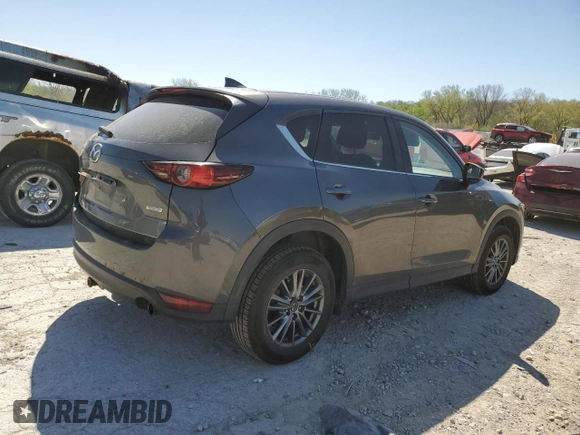 2017 Mazda CX-5 Touring with VIN JM3KFACL1H0100436, listed as a Copart auction lot 53058875 with 77,205 mi miles and Salvage Title. Bid and sale history available at DreamBid. Image 3.