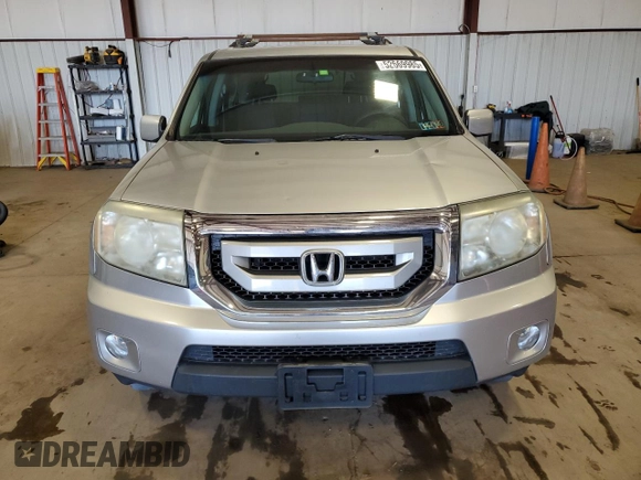 2011 Honda Pilot EX with VIN 5FNYF4H41BB082857, listed as a Copart auction lot 52669985 with 288,165 mi miles and Salvage Title. Bid and sale history available at DreamBid. Image 5.
