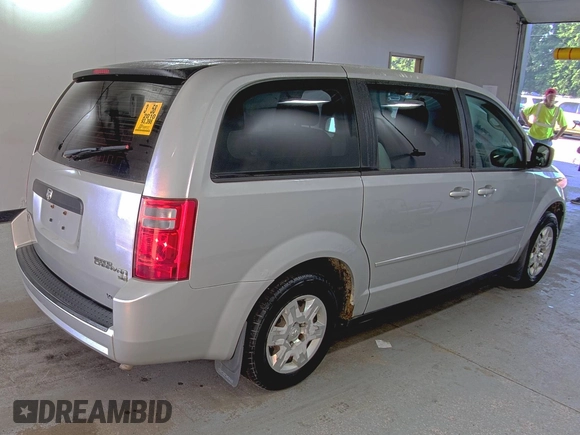 2010 Dodge Grand Caravan SE z VIN 2D4RN4DEXAR412152, wystawiony jako IAAI lot #42825395 z przebiegiem 93 398 mil mil oraz . Historia ofert i sprzedaży dostępna na DreamBid. Obrazek 13.