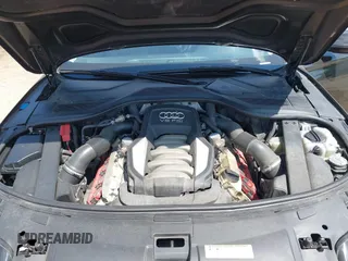 2011 Audi A8 with VIN WAURVAFD6BN005425, listed as a IAAI auction lot 42623409 with 264,365 mi miles and . Bid and sale history available at DreamBid. Image 10.