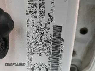 2013 Toyota Tacoma z VIN 5TFMU4FN1DX016379, wystawiony jako Copart lot #57460865 z przebiegiem 174 821 mil mil oraz Szkoda całkowita • Salvage title. Historia ofert i sprzedaży dostępna na DreamBid. Obrazek 13.