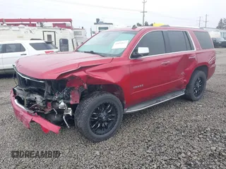 2015 Chevrolet Tahoe LTZ z VIN 1GNSKCKC6FR276531, wystawiony jako IAAI lot #41692617 z przebiegiem 124 010 mil mil oraz . Historia ofert i sprzedaży dostępna na DreamBid. Obrazek 2.