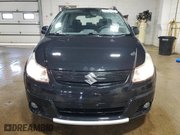 2009 Suzuki SX4 Touring AWD with VIN JS2YB417496202243, listed as a Copart auction lot 53842055 with 70,544 mi miles and Salvage Title. Bid and sale history available at DreamBid. Image 5.