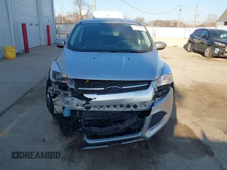 2016 Ford Escape SE with VIN 1FMCU9GX0GUA13421, listed as a IAAI auction lot 41788760 with 123,062 mi miles and . Bid and sale history available at DreamBid. Image 13.
