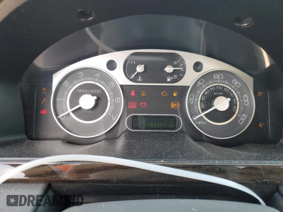 2009 Mercury Sable with VIN 1MEHM40W89G614672, listed as a Copart auction lot 72284684 with 166,607 mi miles and Salvage title. Bid and sale history available at DreamBid. Image 9.