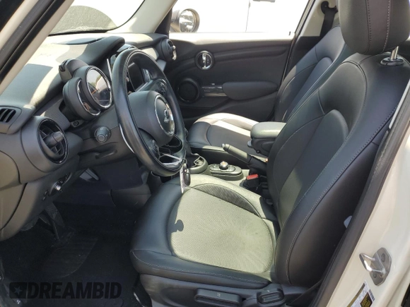 2017 MINI Hardtop 4 Door Cooper with VIN WMWXU1C32H2F77790, listed as a Copart auction lot 62352415 with 71,661 mi miles and Salvage title. Bid and sale history available at DreamBid. Image 7.