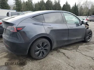 2025 Tesla Model Y Long Range with VIN 7SAYGDEE5SF296652, listed as a Copart auction lot 46664465 with 452 mi miles and Salvage Title. Bid and sale history available at DreamBid. Image 3.