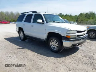 2004 Chevrolet Tahoe Z71 z VIN 1GNEK13ZX4R269230, wystawiony jako IAAI lot #41780307 z przebiegiem 249 453 mil mil oraz . Historia ofert i sprzedaży dostępna na DreamBid. Obrazek 1.