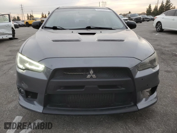 2010 Mitsubishi Lancer Evolution GSR with VIN JA32W8FV1AU027600, listed as a Copart auction lot 84328974 with 88,417 mi miles and Salvage Title. Bid and sale history available at DreamBid. Image 5.